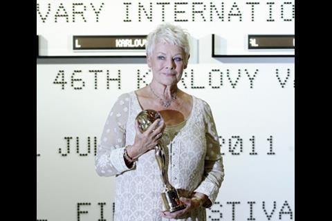 Dame Judi Dench with her Crystal Globe